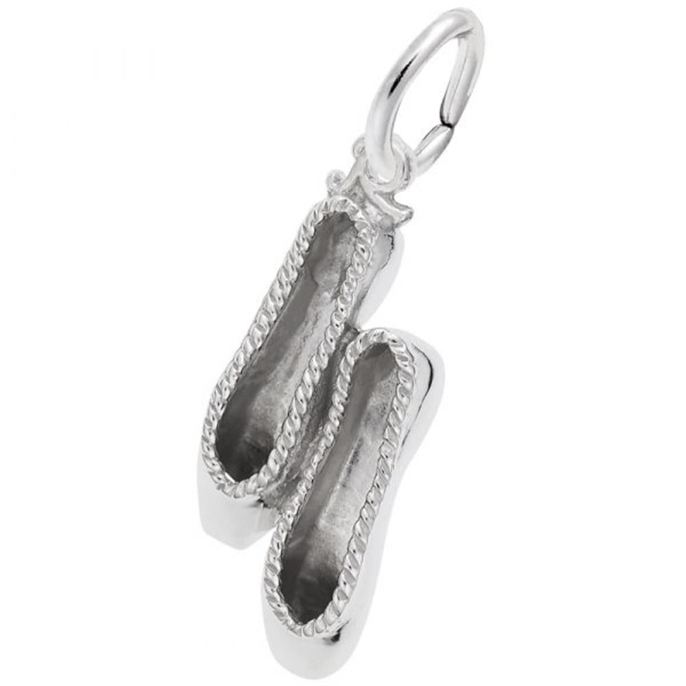 The image shows the Sterling Silver Small Ballet Slippers Charm from Rembrandt Charms. The charm is crafted in sterling silver and features a detailed design of a pair of ballet slippers. It measures 0.31 inches by 0.71 inches (8 mm x 18 mm) and has the style number 8286. This charm is a perfect keepsake for dancers and ballet enthusiasts.