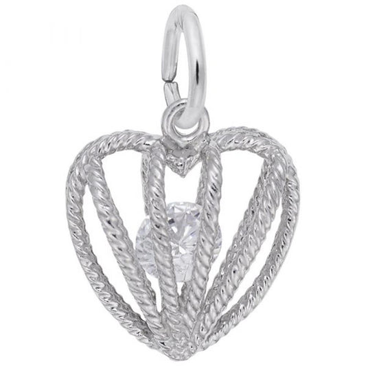 The Embraced with Love April Stone Charm in sterling silver by Rembrandt Charms is a heart-shaped pendant with a rope-like design, featuring a transparent round crystal stone encased in the center. The birthstone charm has a loop at the top for attaching to a chain, adding a touch of elegance to any necklace.