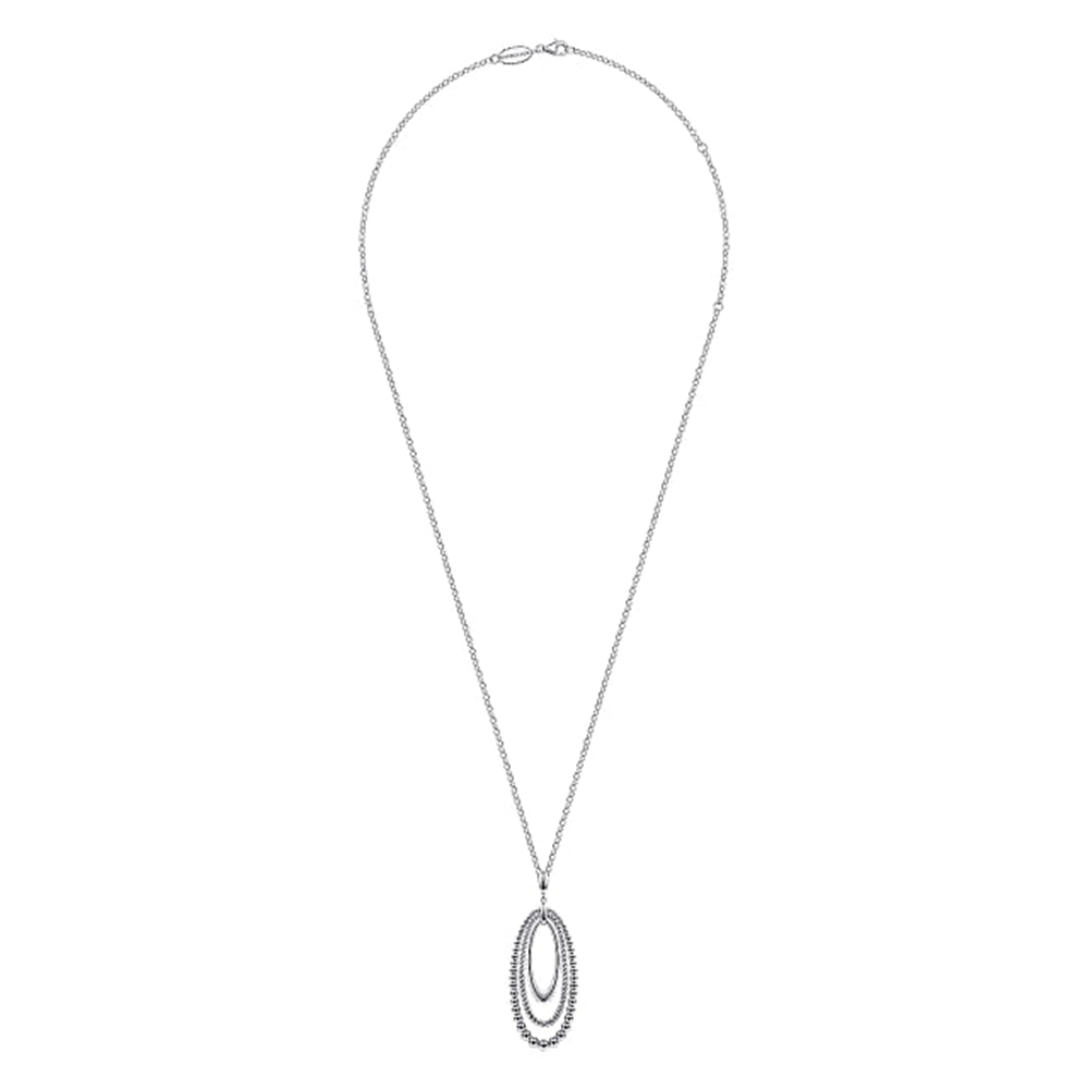 Introducing the Gabriel & Co 925 Sterling Silver Bujukan and Rope Circle Pendant Necklace: a refined piece featuring a long chain and a double-oval pendant. The inner oval is smaller and plain, while the outer oval is studded with small, sparkling stones, creating an elegant layered effect that captures the essence of the Bujukan Collection.
