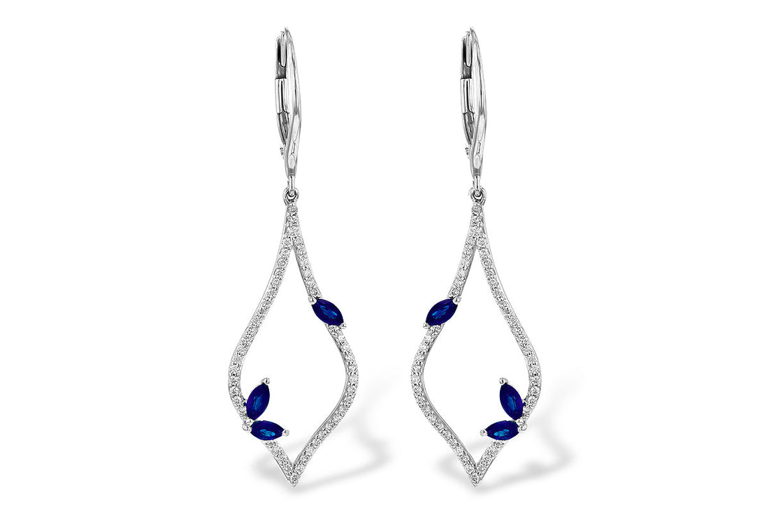 Introducing the Sapphire and Diamonds 14K Gold Dangle Earrings by Allison Kaufman: These elegant earrings feature a marquise-shaped blue sapphire design, embellished with an array of diamonds that highlight their elongated form. Crafted from lustrous 14K white gold, they exhibit a sleek and modern aesthetic with a secure clasp to ensure they stay perfectly in place.