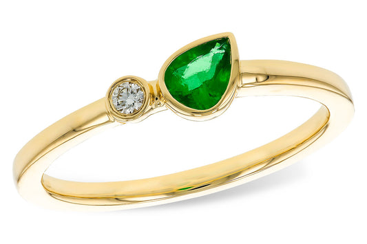 The 14k yellow .20ct emerald ring by Allison Kaufman features a round white diamond and a pear-shaped green gemstone set side by side.