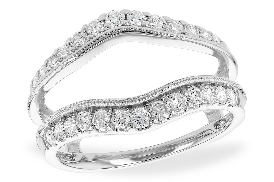 The Allison Kaufman 14K white gold ring guard features a gentle wave design and is set with round white diamonds totaling 0.61 carats, allowing it to nest seamlessly with other rings.