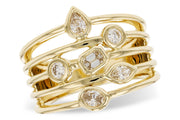 The Fancy Cut Diamonds Ring by Allison Kaufman features five 14K yellow gold bands with round, marquise, pear, and emerald-cut diamonds arranged in an elegant, clustered design.