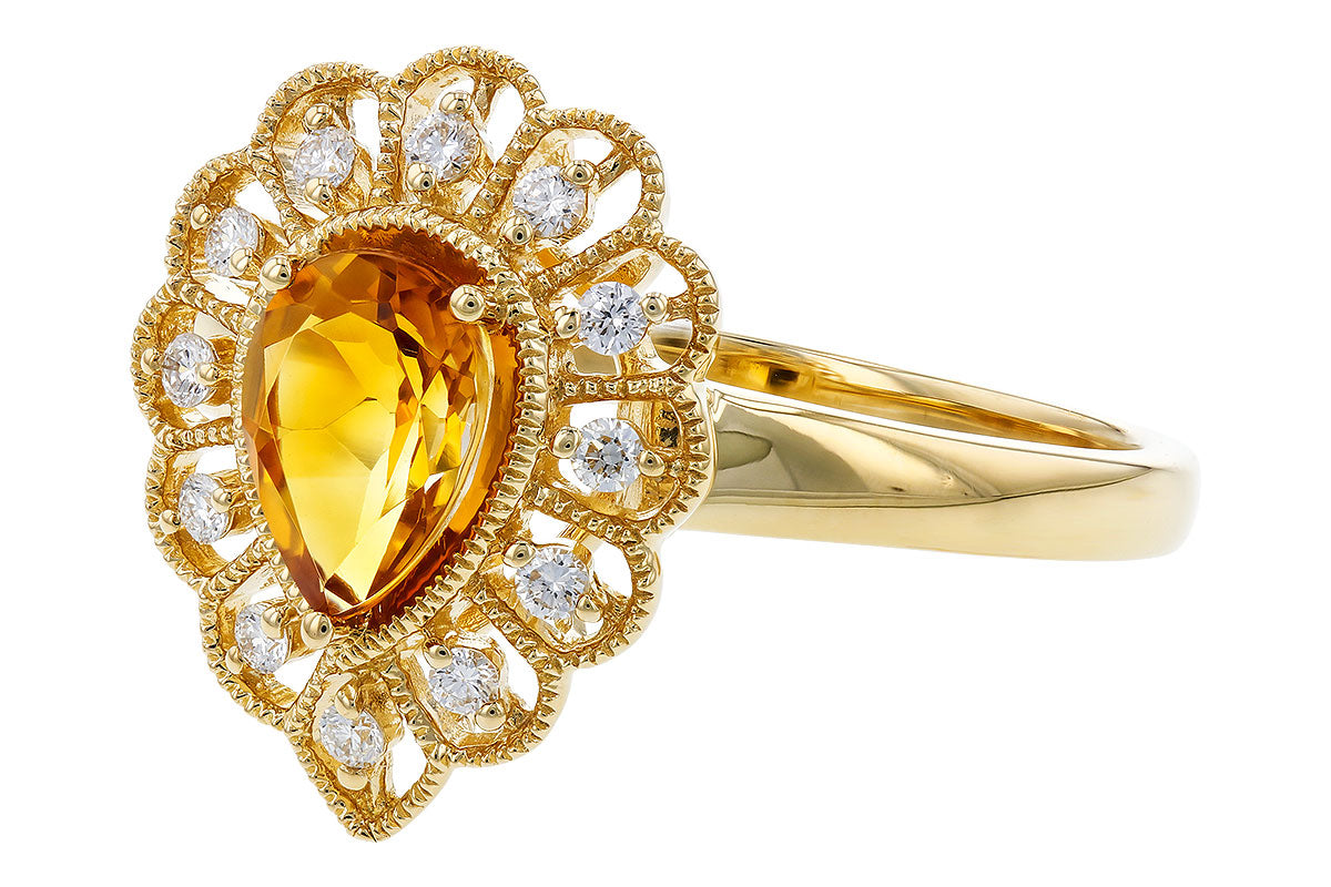 The Allison Kaufman 14K Yellow Gold Citrine and Diamond Ring showcases a pear-shaped citrine center, ornate gold filigree, and a halo of round white diamonds—an ideal November birthstone piece.
