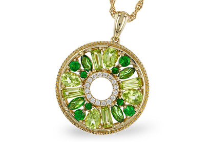 The Allison Kaufman Peridot and Green Garnet Gold Necklace is a round 14K yellow gold pendant with peridot, green garnet, and diamond accents in a circle, featuring an open center and detailed gold edging.