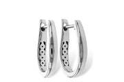 The Allison Kaufman 14K White Gold 15mm Classic Huggies are polished oval hoops with inner cutout details and a hinged clasp, crafted for everyday wear and showcased against a white background.