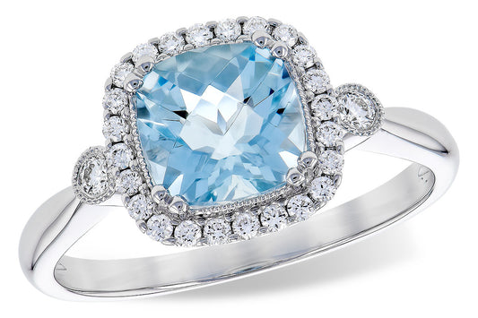 The Allison Kaufman 1.23ct Aquamarine ring features a 7mm cushion-cut aquamarine center stone, surrounded by a halo of round diamonds and diamond accents on the silver band.