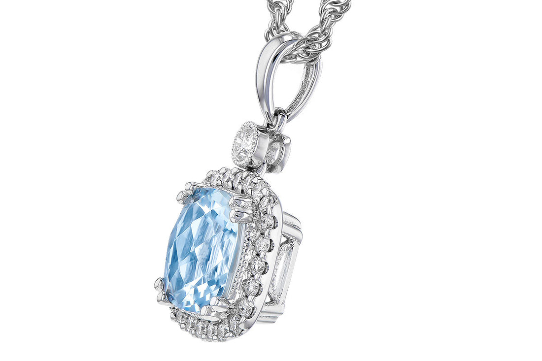 The Allison Kaufman 14K White Gold Aquamarine and Diamond Necklace features a large oval aquamarine gemstone surrounded by sparkling diamonds in a detailed setting.