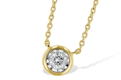The Illusion Diamond Solitaire 14K Gold Necklace by Allison Kaufman features a round diamond in a smooth bezel set in 14K yellow gold, shining with classic elegance against a white background.