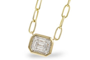 The Allison Kaufman 14K Yellow Gold Diamond Pendant Necklace showcases a rectangular baguette diamond framed by smaller diamonds, set on large, elongated links for a modern minimalist look.