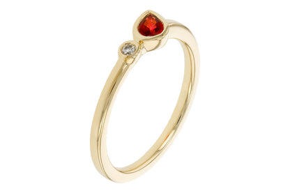 The Allison Kaufman 14k yellow .24c ruby ring features a slim band with a teardrop-shaped red ruby and a small round clear gemstone set side by side.