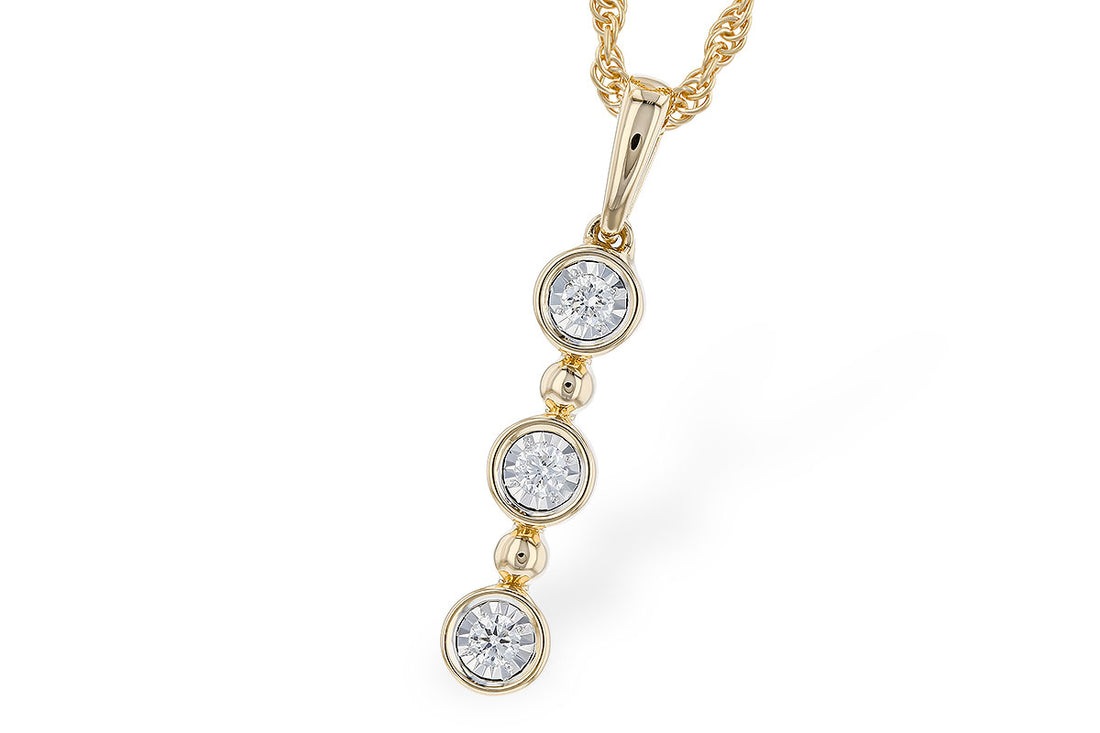 The Allison Kaufman 14k yellow 3 diamond drop pendant features three round diamonds set vertically with gold bead accents on a twisted chain, offering timeless style and elegance.