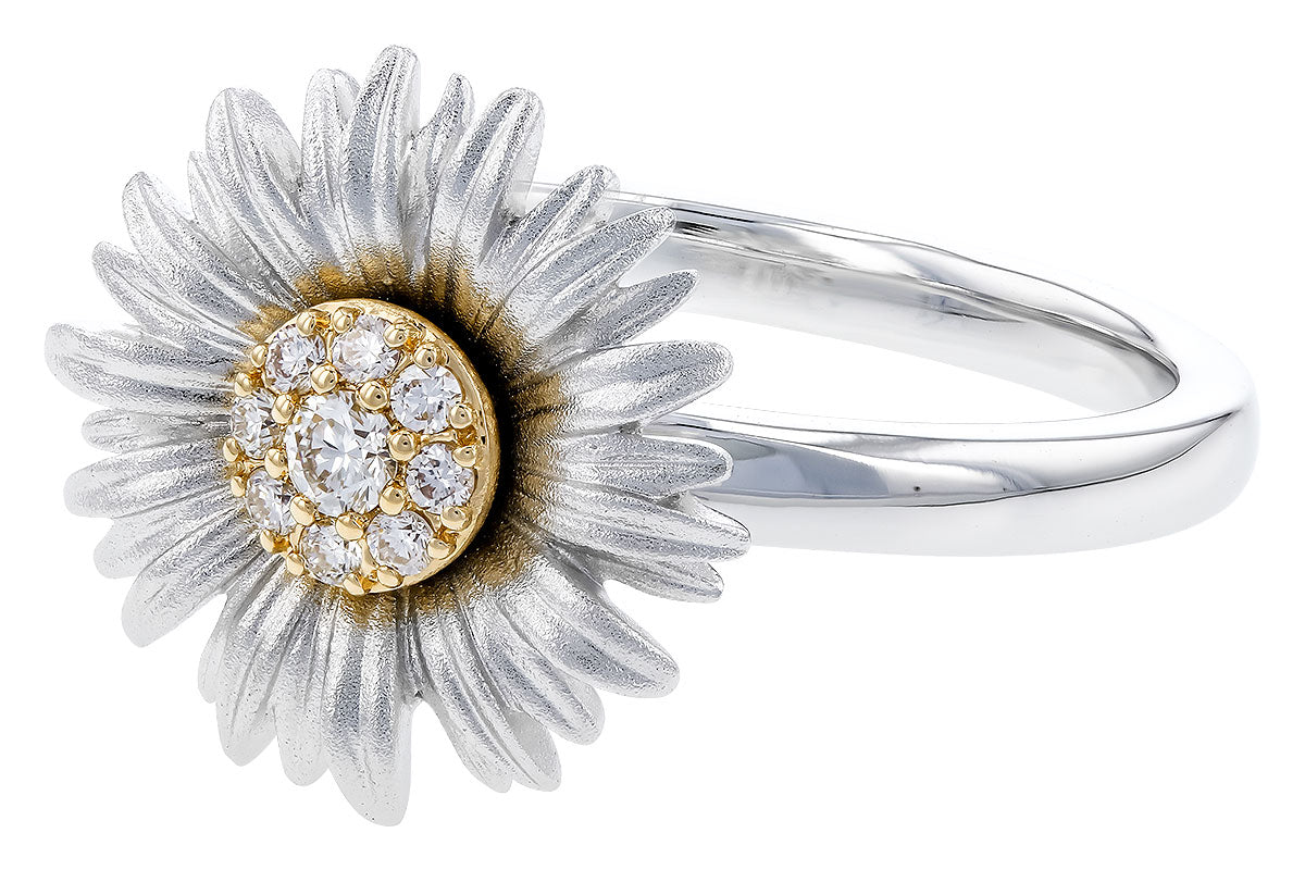 The Allison Kaufman Two-Tone Gold Sunflower Diamond Ring features a daisy-inspired design with white petals, a gold center, and sparkling round diamonds for a touch of natural elegance.