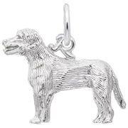 The Labrador Dog Charm by Rembrandt Charms is crafted from sterling silver and shaped like a standing Labrador, complete with detailed fur texture, an open mouth, and a raised tail. A small loop on top makes it easy to attach to a necklace or bracelet.