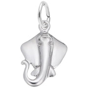 The Stingray Charm / Sterling Silver by Rembrandt Charms showcases a detailed design with smooth edges, highlighted by a gracefully curled tail. Featuring a small loop at the top for effortless attachment to jewelry, this charm beautifully captures the stingray's wide, flat body and distinctive tail.