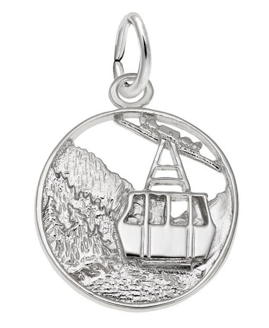 The image shows the Sterling Silver Banff Mountain Gondola Disc Charm from Rembrandt Charms. The charm is crafted in sterling silver and features a detailed design of the Banff Mountain Gondola on a disc. It measures 0.66 inches by 0.66 inches (16.84 mm x 16.84 mm) and has the style number 3421. This charm is a perfect keepsake for nature lovers and adventure enthusiasts.