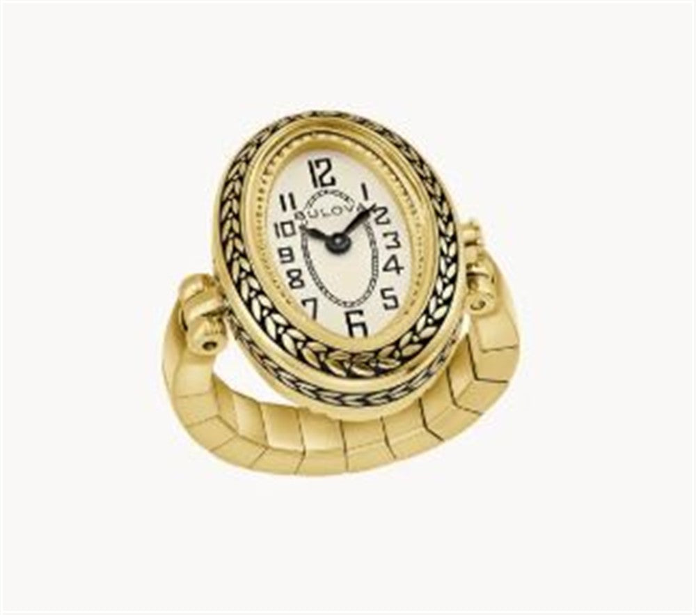 The Bulova Watch Company 97L188 Ring Watch from the Archive series features an oval face with black numerals, ornate bezel detailing, and a flexible gold band, shown against a plain white background.