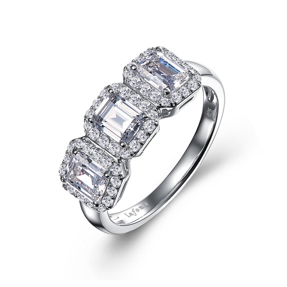 The Three-Stone Halo Engagement Ring by Lafonn features a trio of rectangular-cut simulated diamonds arranged in a row, each encircled by smaller round diamonds. The sterling silver band has a polished finish, with intricate detailing that accentuates the brilliance of this timeless classic.