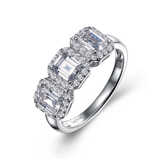 The Three-Stone Halo Engagement Ring by Lafonn features a trio of rectangular-cut simulated diamonds arranged in a row, each encircled by smaller round diamonds. The sterling silver band has a polished finish, with intricate detailing that accentuates the brilliance of this timeless classic.