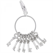 The Rembrandt Charms "I Love You Skeleton Key Ring" is a sterling silver keyring featuring dangling letter charms that spell out "I LOVE YOU." The charms are attached to a circular ring with a clasp at the top for easy attachment.