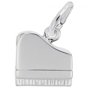 The Rembrandt Charms Piano Charm, crafted from polished sterling silver, features exquisite detailing including piano keys and lid, and is designed with a small loop for easy attachment to a bracelet or necklace.