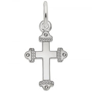 The Rembrandt Charms Medieval Cross Charm, crafted from sterling silver, boasts an ornate design with rounded accents on each end and a small loop at the top for easy attachment to a chain. Its smooth, reflective surface is enhanced by decorative dots along the ends.