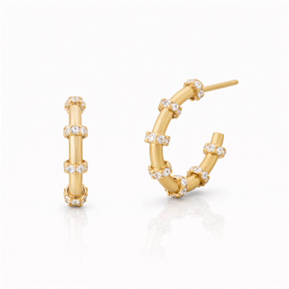 Freida Rothman PYZE020466B Signature Cityscape Cable Hoop Earrings feature a segmented gold design with clusters of small sparkling diamonds, beautifully displayed against a plain white background.