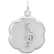 A sterling silver pendant by Rembrandt Charms, shaped like a flower with a textured background, featuring a raised treble clef symbol in the center.