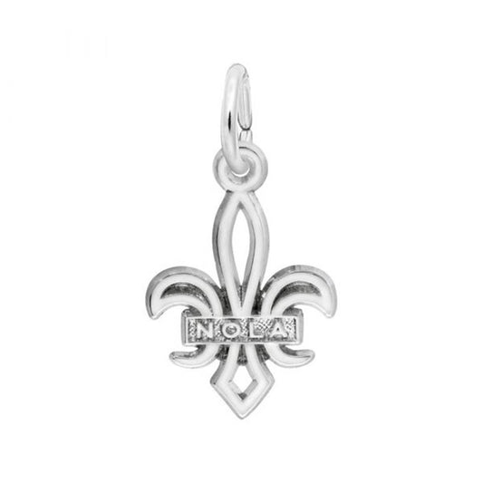 The Nola Fleur De Lis Charm in Sterling Silver by Rembrandt Charms features a fleur-de-lis design intricately detailed and engraved with "NOLA" across the center. This elegant charm attaches easily to a chain or keyring.