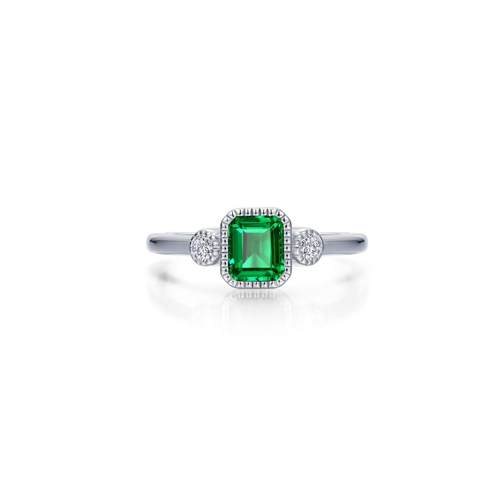 The Lafonn size 7 emerald ring features a square-cut green center stone flanked by two round clear stones, showcased on a plain white background.