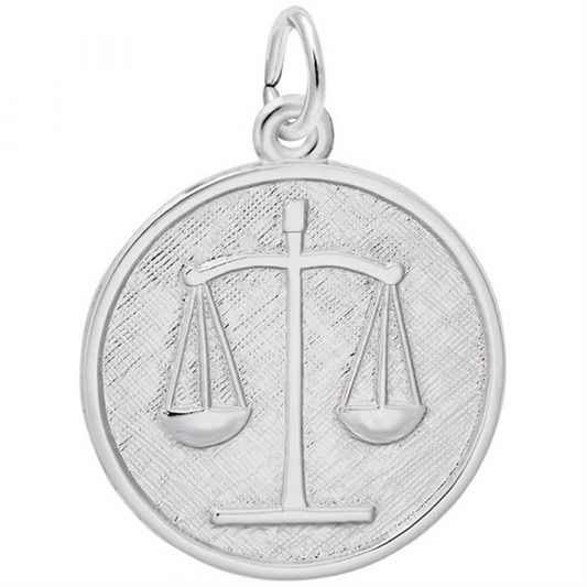 The Scales of Justice Charm/ Sterling Silver by Rembrandt Charms showcases a raised design of the Scales of Justice on a textured round background. This pendant symbolizes justice and balance, featuring a small loop at the top for easy attachment to a chain.