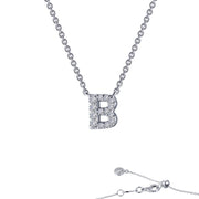 The "Letter B Pendant Necklace" by Lafonn showcases a sterling silver pendant in the shape of the letter "B," adorned with small diamonds. The delicate chain includes an adjustable clasp and additional small decorative elements, all set against a plain white background.