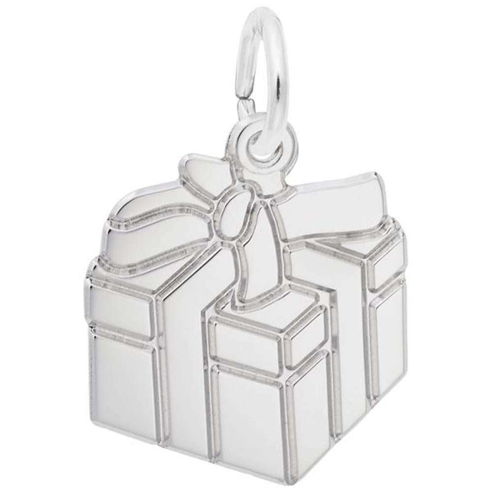 A close-up of the Rembrandt Charms Gift Box Charm in sterling silver showcases its smooth, polished surfaces and intricate detailing. The charm, designed with a bow on top and a loop for easy attachment to a bracelet or necklace, exudes elegance and craftsmanship.