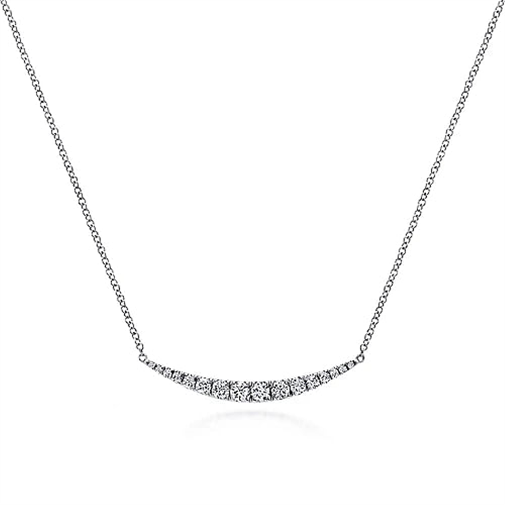 Introducing the 14K White Gold Curved Diamond Bar Necklace from Gabriel & Co's Kaslique Collection, showcasing a thin chain and a crescent-shaped pendant adorned with small, sparkling diamonds. The simple and elegant design centers the pendant, creating a focal point of subtle brilliance.