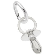 The Rembrandt Charms Pacifier Charm in sterling silver is designed as a realistic baby pacifier, complete with a smooth, polished surface, pacifier teat, and loop handle. It features a ring at the top to easily attach to a necklace or bracelet.