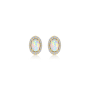 The Lafonn ER CL/SIMULATED OPAL S.S GP 1.94 CTW OPAL HALO STUDS ER features oval-shaped simulated opal earrings accented with tiny, sparkling diamonds and set in a gold backing. These opals exhibit a vibrant spectrum of colors, including pink, green, and blue. The image is displayed against a plain white background to highlight the intricate design of these stunning halo studs.