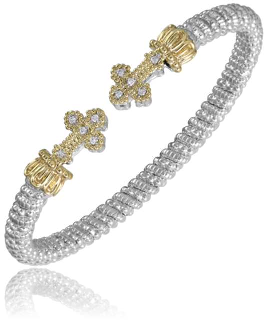The Alwand Vahan Jewelry sterling silver bracelet boasts a 4mm band with a textured, rope-like design and two intricately detailed 14k gold cross motifs. Each cross, serving as the clasp at the center of the bracelet, is adorned with small, sparkling diamonds totaling 0.10 carats.