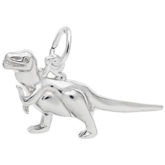 The Rembrandt Charms T-Rex Charm in Sterling Silver features a playful, detailed T-Rex design with a friendly expression and an attached circular loop at the top for easy attachment to a necklace or bracelet.