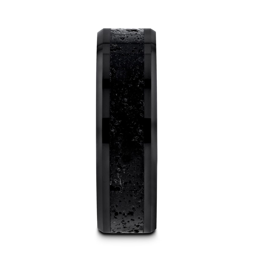 The VESUVIUS Men’s Polished Black Ceramic Wedding Band by Thorsten features a rugged black and gray lava rock stone inlay with polished beveled edges, shown in a vertical position against a plain white background.