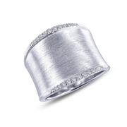 Introducing the Sleek Wide Band Cuff Ring by Lafonn, expertly crafted from sterling silver and bonded with platinum. This ring features a wide, brushed metal design with a matte finish. The top and bottom edges are adorned with Lafonn's signature Lassaire simulated diamonds, adding an elegant touch to the piece.