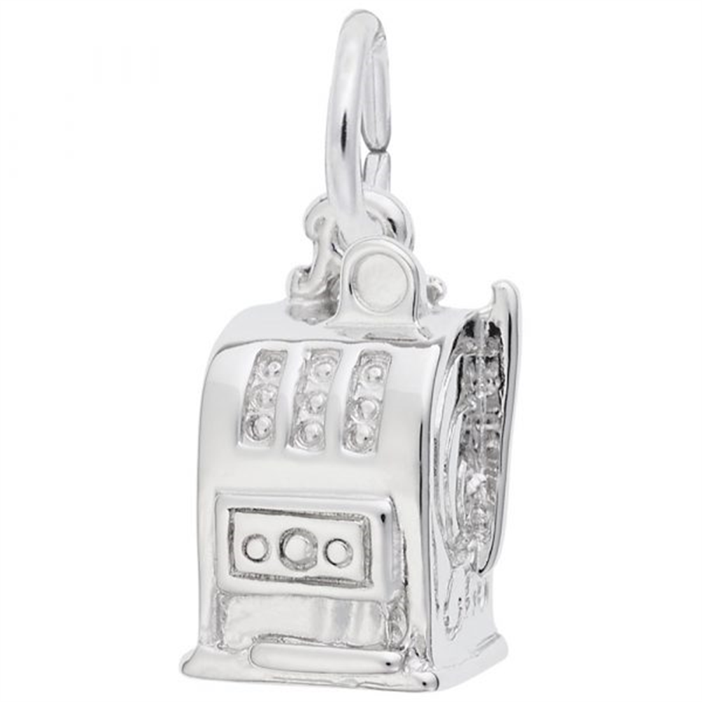 The Las Vegas Slot Machine Charm - SS by Rembrandt Charms is a silver-colored charm shaped like a slot machine, featuring intricate details such as reels, buttons, and a side handle. It includes a small loop at the top for easy attachment to a bracelet or necklace.