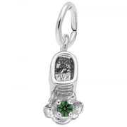 The image shows the Sterling Silver May Baby Bootie Charm from Rembrandt Charms. This charm is delicately crafted in sterling silver and features a beautiful emerald-colored stone at the front, symbolizing the birthstone for May. The charm has dimensions of 0.24 inches by 0.44 inches (6.09 mm x 11.21 mm) and the style number is 0473-005. It's an ideal keepsake to commemorate the birth of a loved one in May, adding a personal and meaningful touch to any charm bracelet