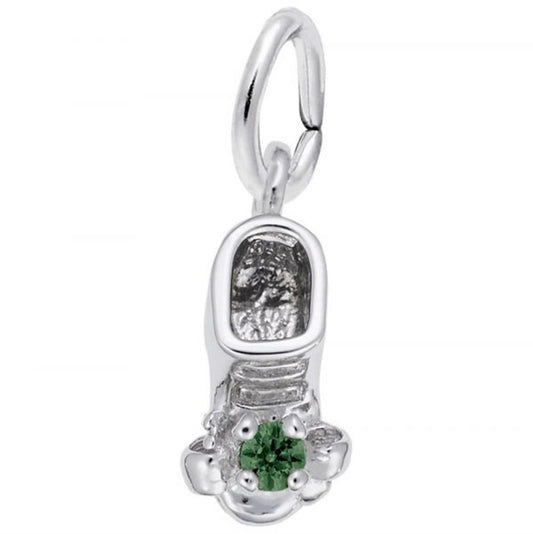 The image shows the Sterling Silver May Baby Bootie Charm from Rembrandt Charms. This charm is delicately crafted in sterling silver and features a beautiful emerald-colored stone at the front, symbolizing the birthstone for May. The charm has dimensions of 0.24 inches by 0.44 inches (6.09 mm x 11.21 mm) and the style number is 0473-005. It's an ideal keepsake to commemorate the birth of a loved one in May, adding a personal and meaningful touch to any charm bracelet