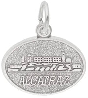 Sterling silver Alcatraz Oval Disc charm by Rembrandt Charms, featuring an engraved depiction of Alcatraz Island and the word "ALCATRAZ" below, with a small loop for attachment. Dimensions: 0.72 in x 0.53 in (18.2 mm x 13.53 mm).