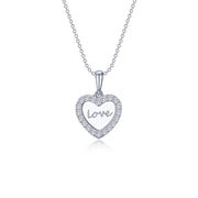 The Love Heart Necklace by Lafonn is a sterling silver pendant featuring a heart-shaped charm adorned with small gemstones along its border. Elegantly written in cursive at the center of the heart is the word "love." This exquisite pendant hangs from a delicate silver chain, showcasing timeless classics and Lassaire simulated diamonds.