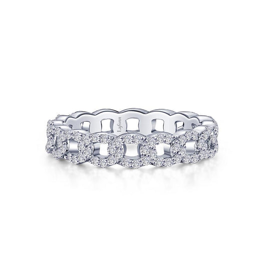A close-up of the Lafonn Interlocking Circles Eternity Band reveals its silver design with each interlocking circle encrusted with small round diamonds, set against a white background. The inner part of the ring has a smooth surface inscribed with "14k.