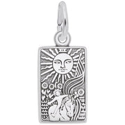 The Tarot Card Charm by Rembrandt Charms is a rectangular sterling silver pendant engraved with a sun featuring a face at the top, emitting radiant rays downward. Below the sun, the intricate design includes flowers, a woman's head with flowing hair, and a detailed border that evokes the style of a tarot card. The charm comes with an attached loop for wearing.