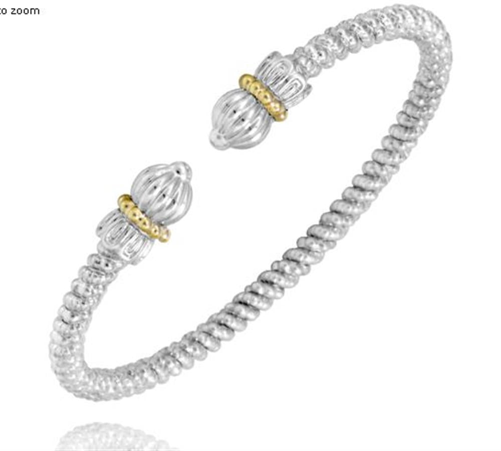 Discover the elegant Alwand Vahan Jewelry's 3MM Open Band /14KY and SS, a silver cuff bracelet featuring a spiraled texture. Each end is adorned with a detailed, bulbous silver design accented by gold-colored bands. The open-ended bracelet offers flexibility and showcases the beautiful craftsmanship of SS with 14KY accents.