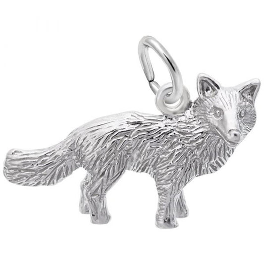 The Fox Charm from Rembrandt Charms is crafted in sterling silver and showcases intricate fur detailing, a bushy tail, and a loop on its back for attaching to a necklace or bracelet. This charm features a fox standing and facing forward.