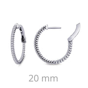The Diamond Hoop Earrings by Lafonn feature a series of small, round simulated diamonds encircling the entire sterling silver loop. The image displays one earring closed and the other open to showcase their mechanism, with a measurement of 20 mm indicated below them.